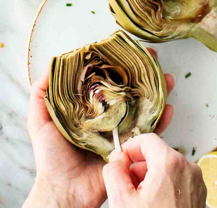 Stuffed artichokes artichoke baked recipe recipes simplyrecipes visit italian appetizer